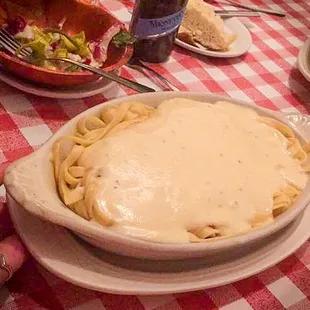 Huge portion of the family meal of alfredo. we ate for 3 days after haha.