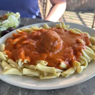 Homemade cavatelli with creamy roasted red pepper sauce