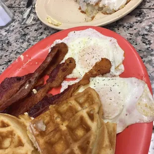  breakfast of waffles, eggs and bacon