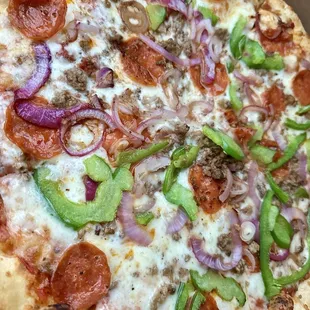 Pepperoni, ground beef, onion &amp; green pepper pizza