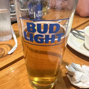 a glass of bud light