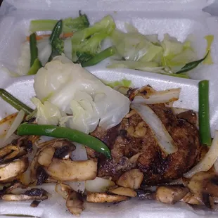 Chop steak with grilled onions and mushrooms, fresh vegetables and mashed potatoes.