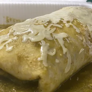 a burrito covered in gravy