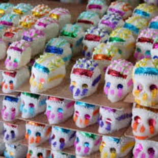 a display of sugar skulls