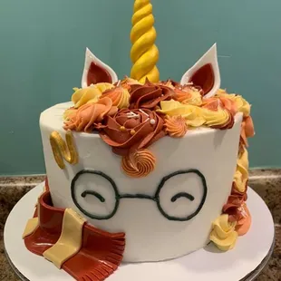 a cake decorated like a unicorn