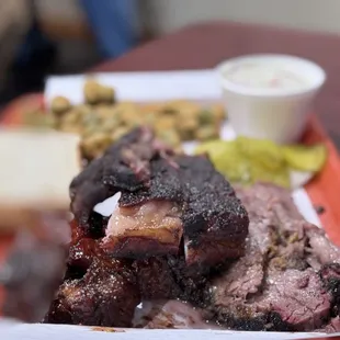 3 meat combo with ribs, sliced brisket, and burnt ends.