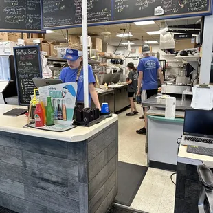 The counter area, where you can see the long kitchen in the background.