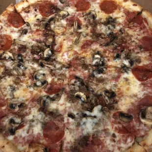 Pepperoni, sausage  Ham &amp; Mushroom's  5/12/23. Watching the game Laker's