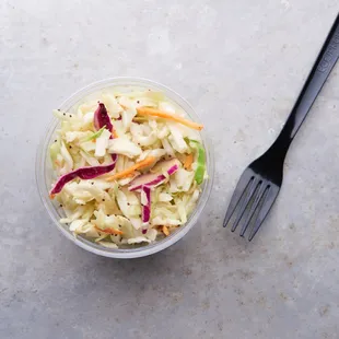 Not your average slaw! We combine a shredded cabbage blend with our own poppyseed vinaigrette dressing for a light, refreshing side dish.