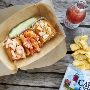 When you can't decide...try the Luke's Trio! A 2 oz portion of each our traditional seafood rolls on half rolls.