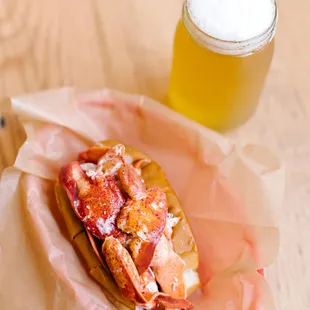 An unmatched duo: Lobster Roll and a local brew.