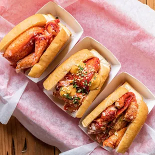 The NEW Luke&apos;s Flight! Three 2 oz lobster rolls featuring three fun flavors: lemon butter, white truffle butter, and spicy Mala.