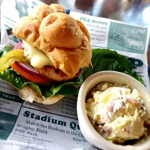 a chicken sandwich and coleslaw