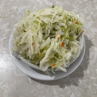 Cole slaw - vinegar based. Tangy at first but once your budz adjust, it's tasty and refreshing!