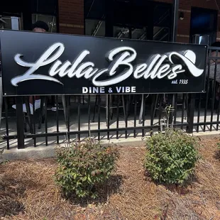 a sign for lulabelle's diner and vine