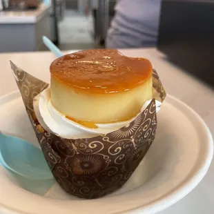 Delicious! Flan topped meringue cupcake.