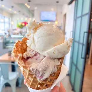 Double scoop with salted caramel and Earl Grey Blackberry  on a brown butter waffle cone