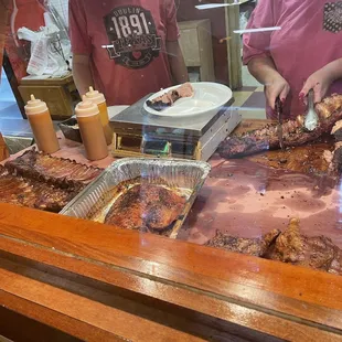 two men preparing food