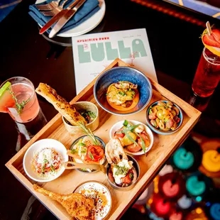 a tray of food and drinks on a table