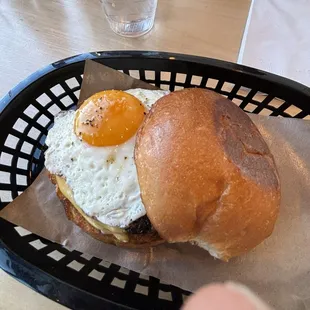 Breakfast on a bun with sunny side up egg