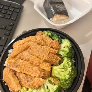 a bowl of chicken and broccoli