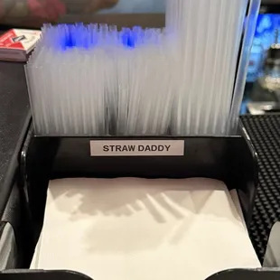 Cute straw / napkin holder.