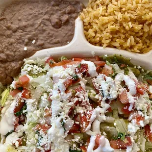 Pollo Hervido Enchilada with green sauce