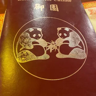 two pandas on a menu