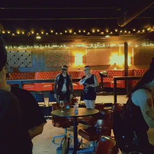 a group of people in a bar