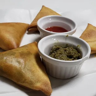 Sambusa ($8). Tasty especially with the spicy green dip.