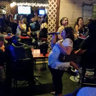 a group of people sitting around a table