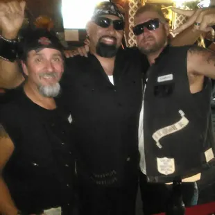 a group of bikers posing for a picture