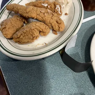 Chicken fingers with mashed potatoes and gravy