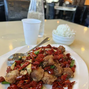 Spicy fried chicken in red peppers