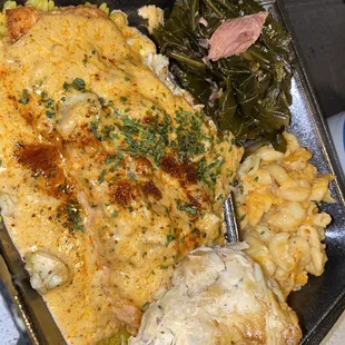 Colllards, Mac &amp; Cheese, Crabs Cake, &amp; Salmon on a bed of Yellow Rice.