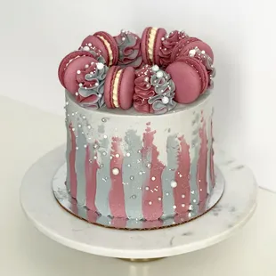 a pink and grey cake