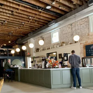 Open and airy.  Love those brick walls