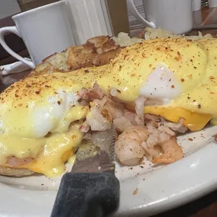 Seafood Benedict - Lobster, shrimp, and crab with American Cheese - $17.50