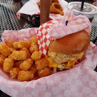 The big burger with ham bacon and an egg