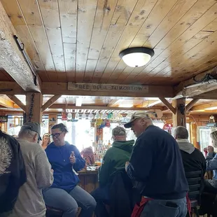 The sign reads, "Free beer tomorrow."