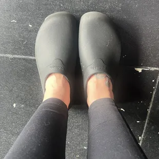 Clogs they give you if you don't have tennis shoes on
