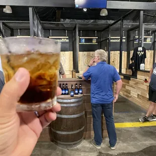 They have alcohol here. Beer, wine and spirits are available. Do not wear open toed shoes if you want to throw axes.