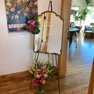 a mirror and flowers