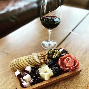 cheese, crackers, olives, and meats