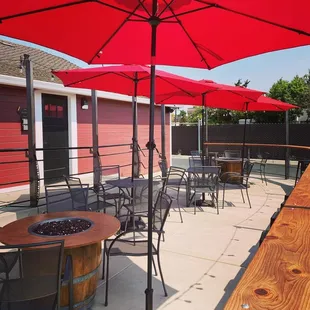 patio with tables and umbrellas