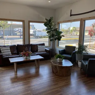 a living room with large windows