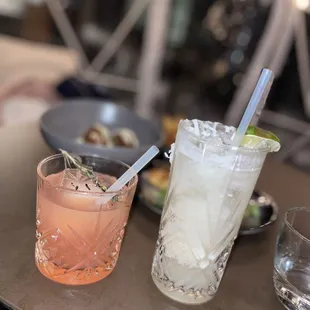 two cocktails on a table