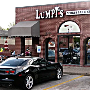 two motorcycles parked in front of the restaurant