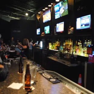 people sitting at the bar