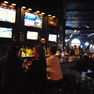 people sitting at the bar